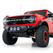 Addictive Desert Designs 21-22 Ford Bronco Bomber Front Bumper with Rigid 360 Mounts and D-Rings in Hammer Black
